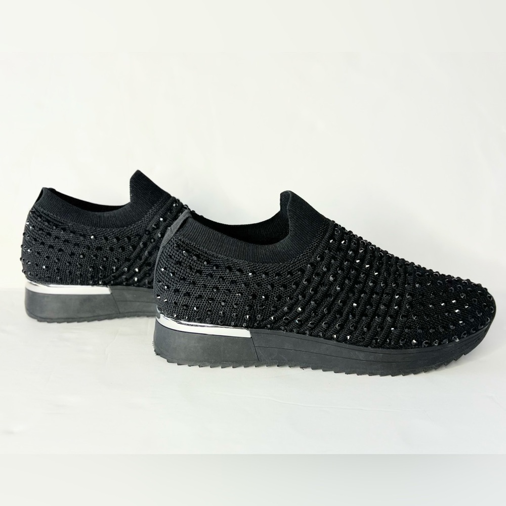 Accepting counter offer)

Black Knit Slip-On Sneaker with Studs Accents